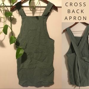 Apron Cross Body, no ties. Slip on apron. Fits small.